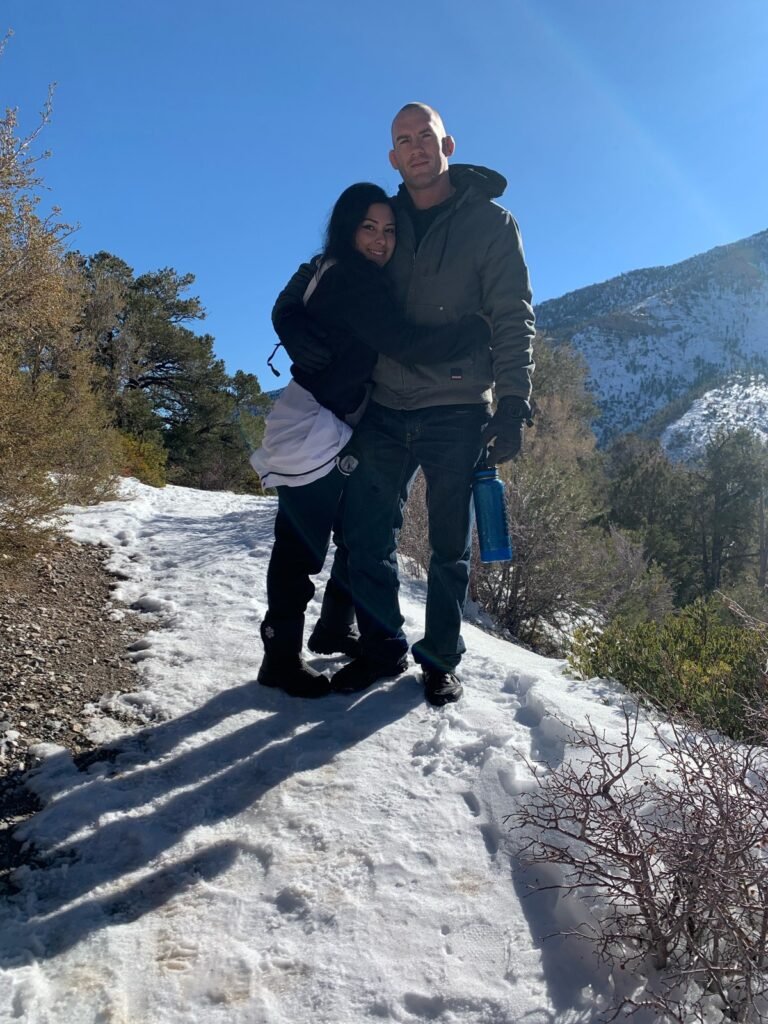 Christoph and Monique on a snowy mountain trail